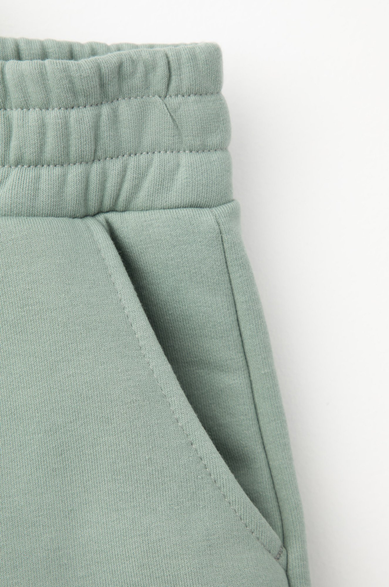 Теплые брюки для девочки из футера с начесом Crockid